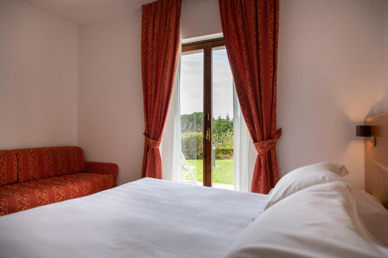 Hotel Villa Paradiso Passignano sul Trasimeno Zimmer foto