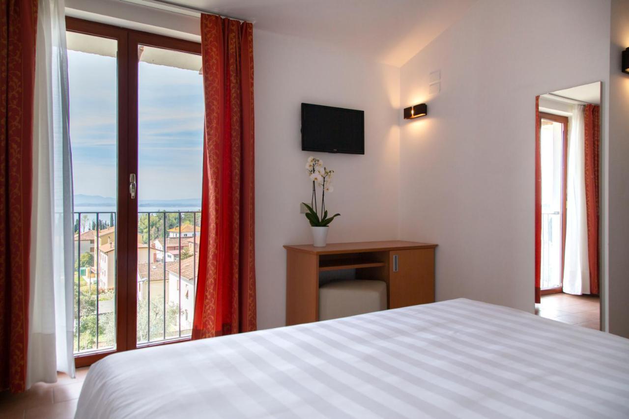 Hotel Villa Paradiso Passignano sul Trasimeno Exterior foto